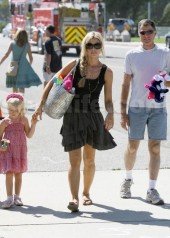 Denise Richards Calls Charlie Sheen “Like a Brother”