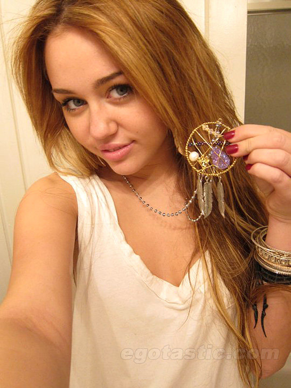 Miley Cyrus Shuts Puts Boob Job Rumors To Rest