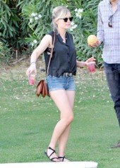Kirsten Dunst Double Fists  Cocktails at Coachella