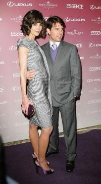 Katie Holmes just likes to hide, is all…