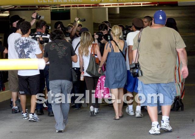 Hilary Causes A Mob Scene.