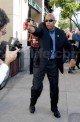 STARZLIFE PICS: Assaultin Pepper! Katies Bodyguard Goes on the Attack 122309 SL Holmes07 80x122 Celebs Photo STARZLIFE PICS: Assaultin Pepper! Katies Bodyguard Goes on the Attack