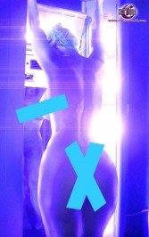 Coco Bares All for Tanning Twit-Pic